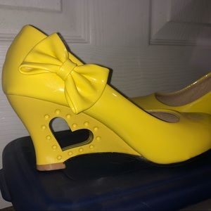 Yellow Wedged Heel with a Bow and Heart Cutout in the Heel